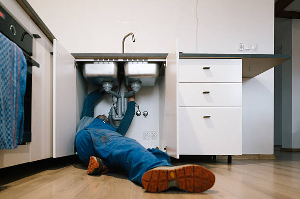 Professional Emergency Plumber technician working in Muskegon, MI